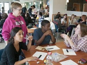 students around a club table